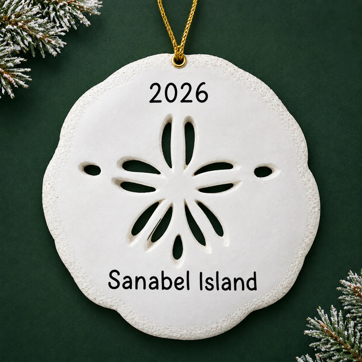 Personalized sand dollar christmas ornament, a white sand dollar, on a dark green pine background