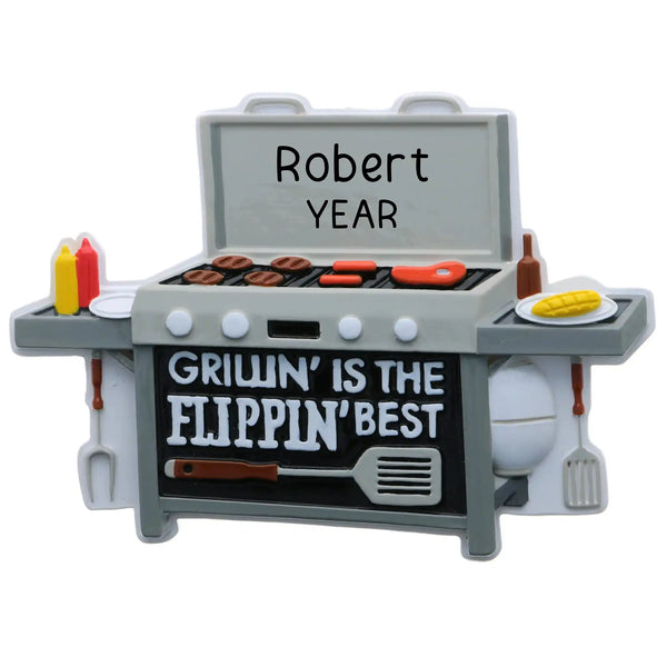 Personalized BBQ grilling Christmas ornament with gray grill, burgers, hot dogs, condiments and Grillin' is the Flippin' Best message, customizable with name and year
