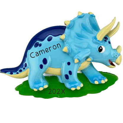 Blue triceratops Christmas ornament personalized with name and year for kids or dinosaur fans