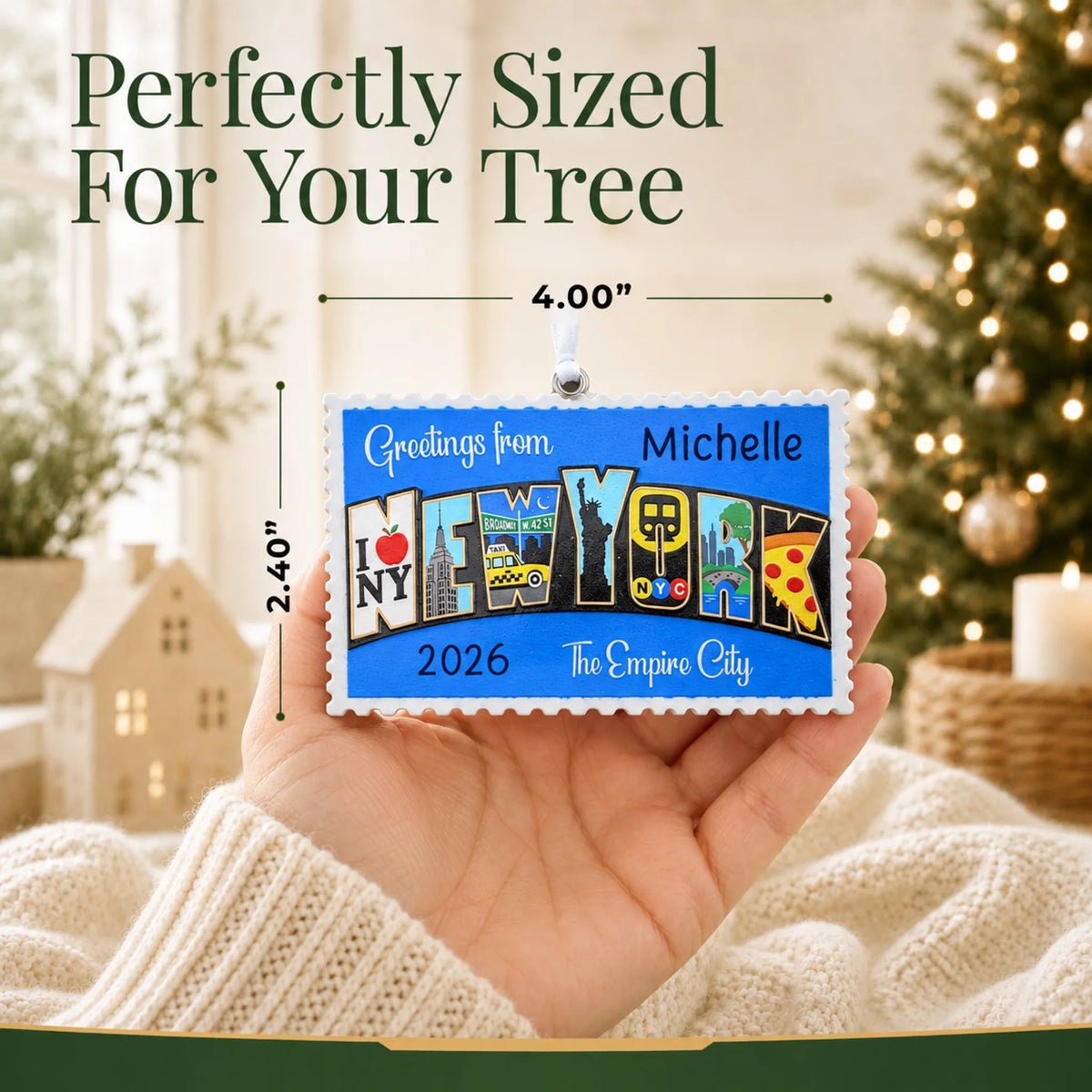Size guide: the personalized New York City postcard christmas ornament is 4.00 in wide by 2.40 in tall, shown in hand