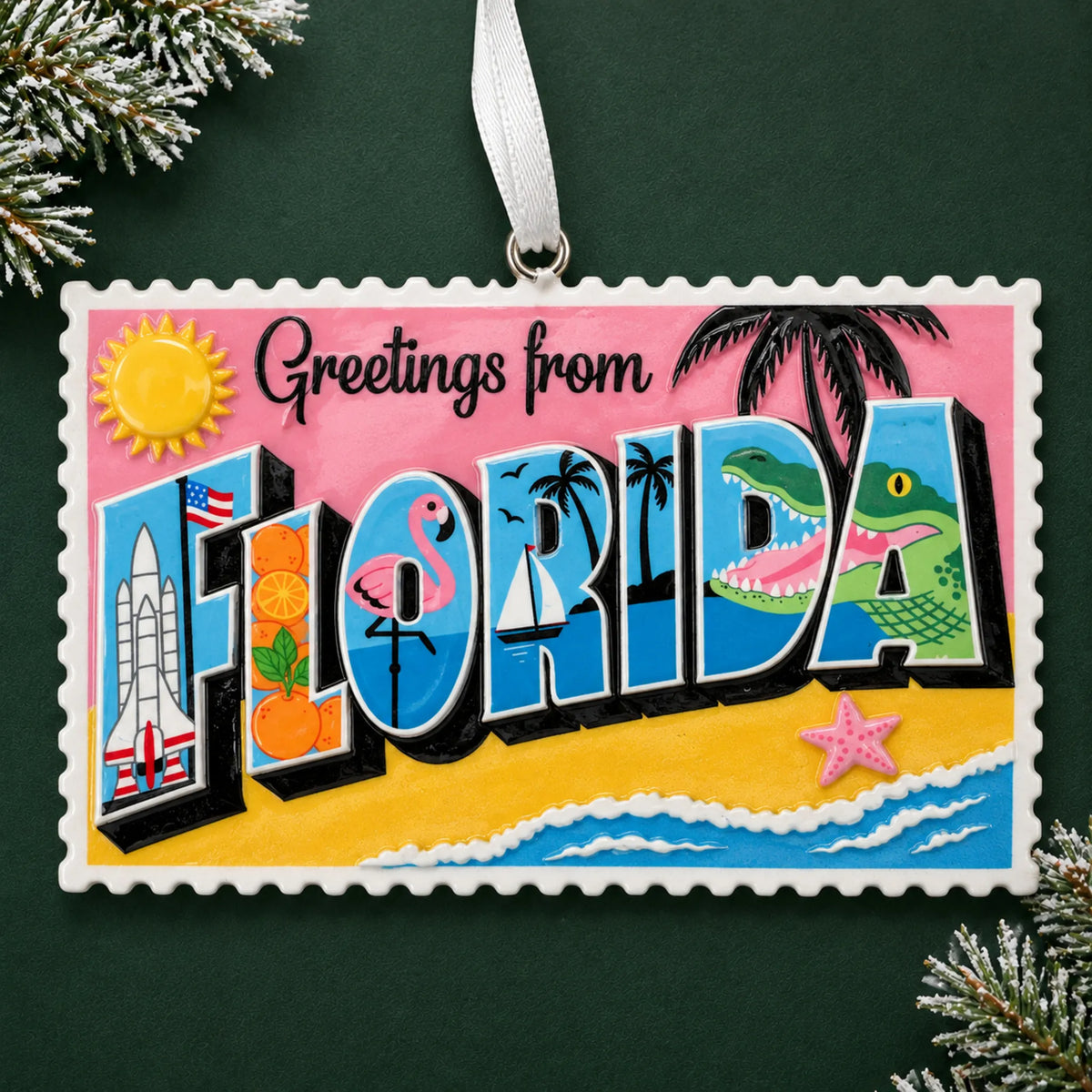 Personalized Florida postcard christmas ornament, a Greetings from Florida postcard, on a dark green pine background