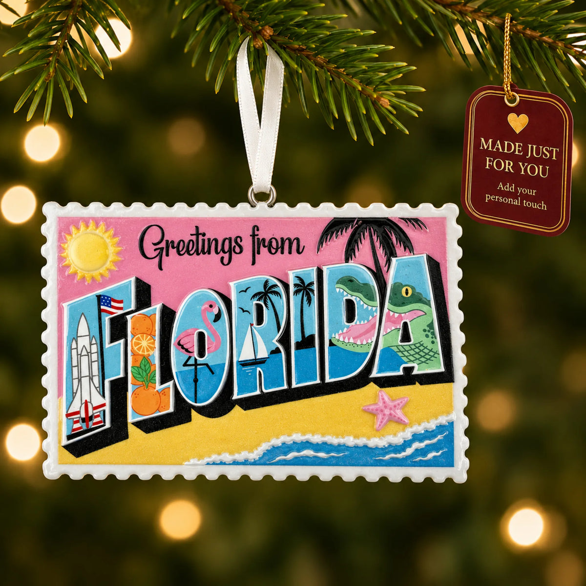 Florida postcard christmas ornament hanging on a lit Christmas tree with a Made Just For You gift tag