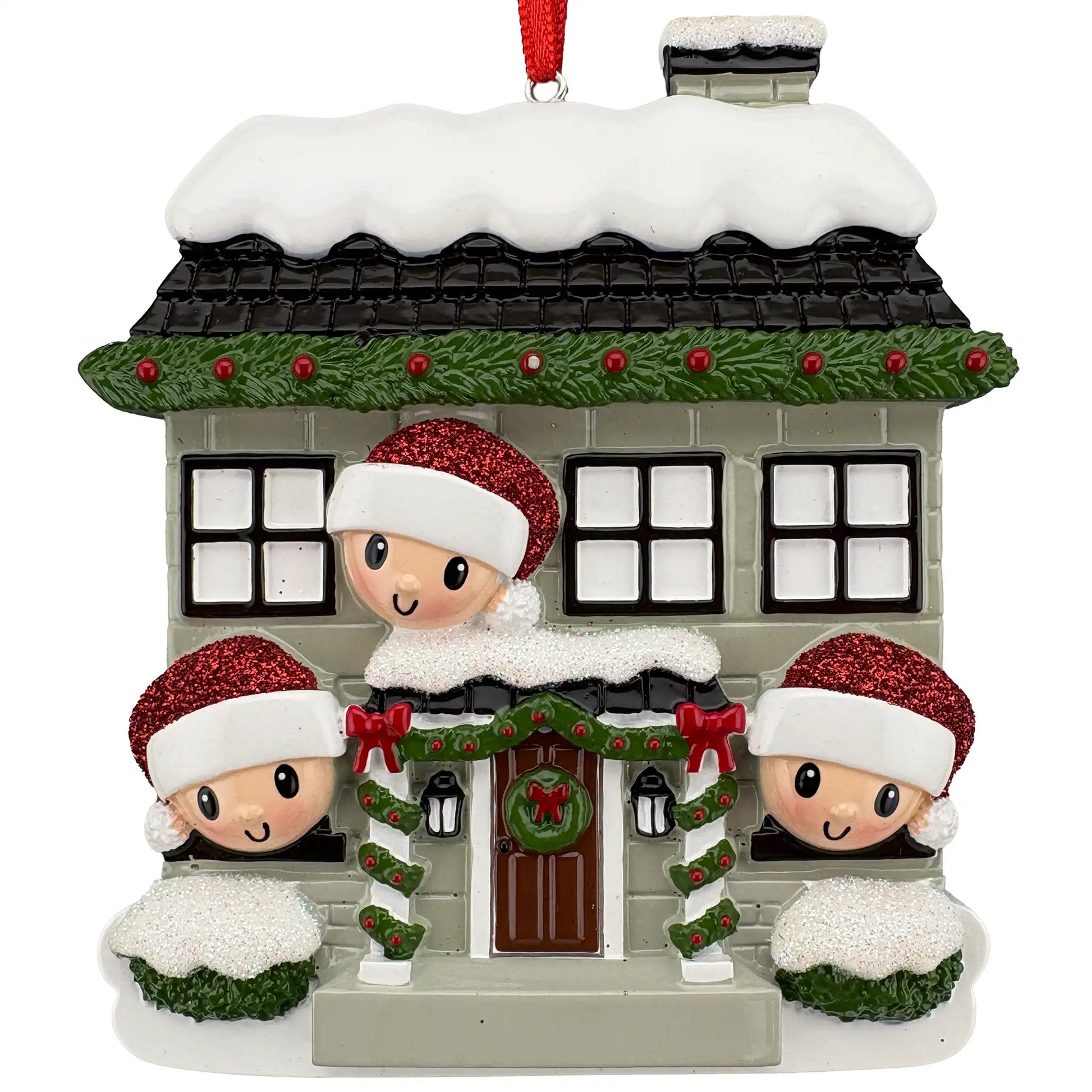 New home family of 3 personalized ornament shown blank, snowy stone house with three Santa hat faces before laser engraving