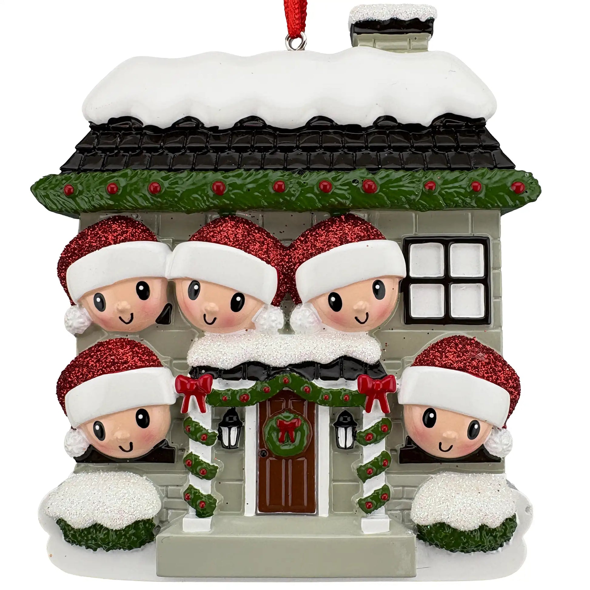 New home family of 5 personalized ornament shown blank, snowy stone house with five Santa hat faces before laser engraving