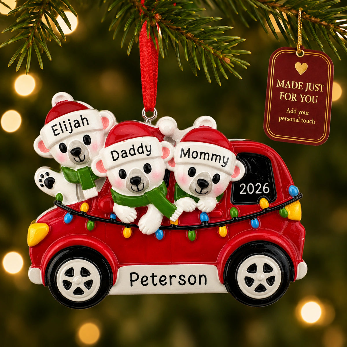 Personalized polar bears family of 3 Christmas ornament in a red car hanging on a tree with a Made Just For You tag