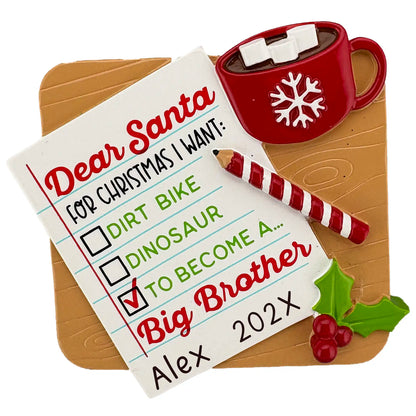 Dear Santa Christmas ornament with cocoa mug and checklist reading “To Become a Big Brother,” personalized with name and year