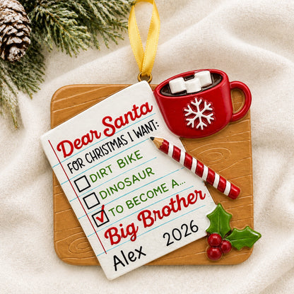 Personalized big brother Christmas ornament as a Dear Santa note hanging on a tree branch