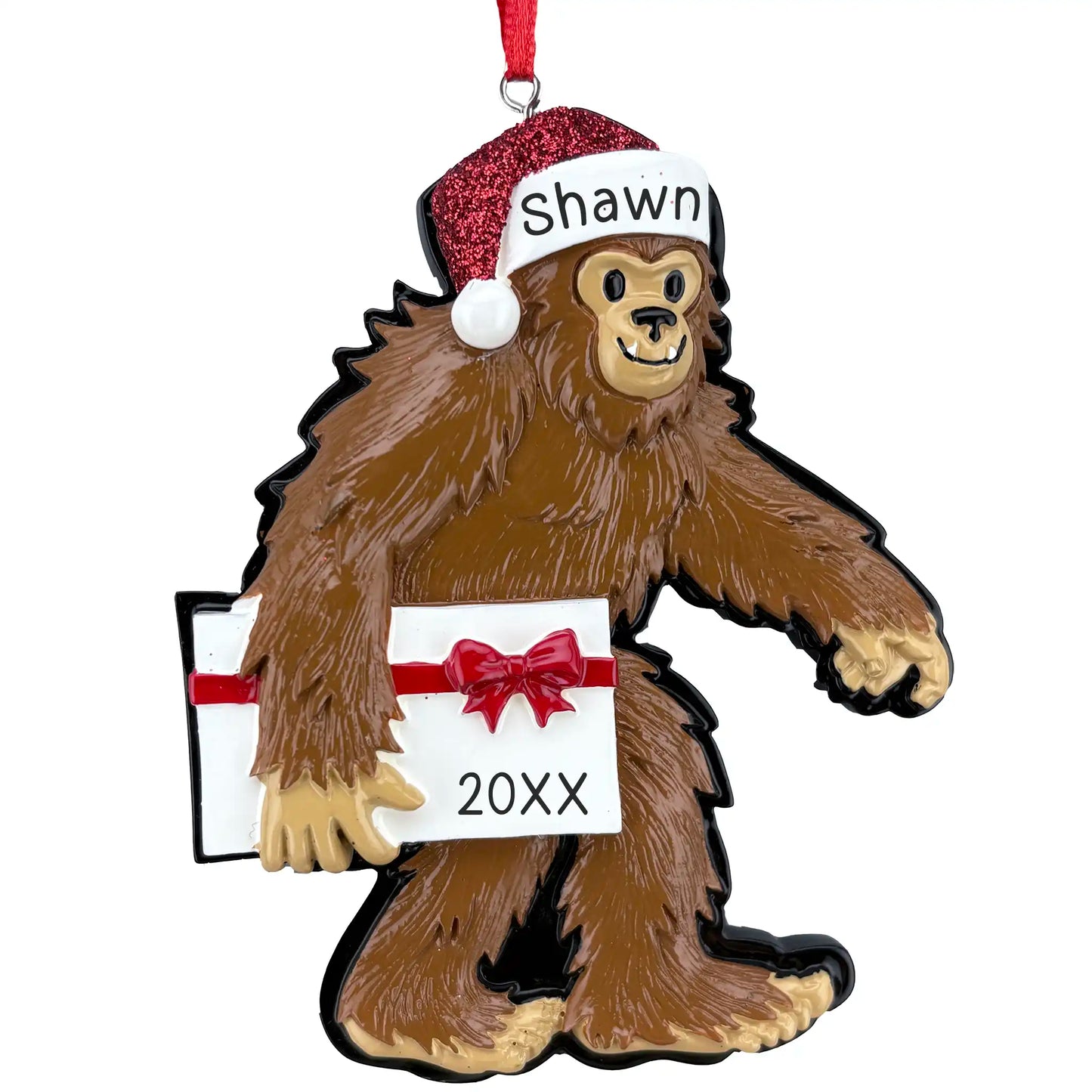 Yeti Bigfoot Christmas ornament with Santa hat, red gift box, and personalized name and year