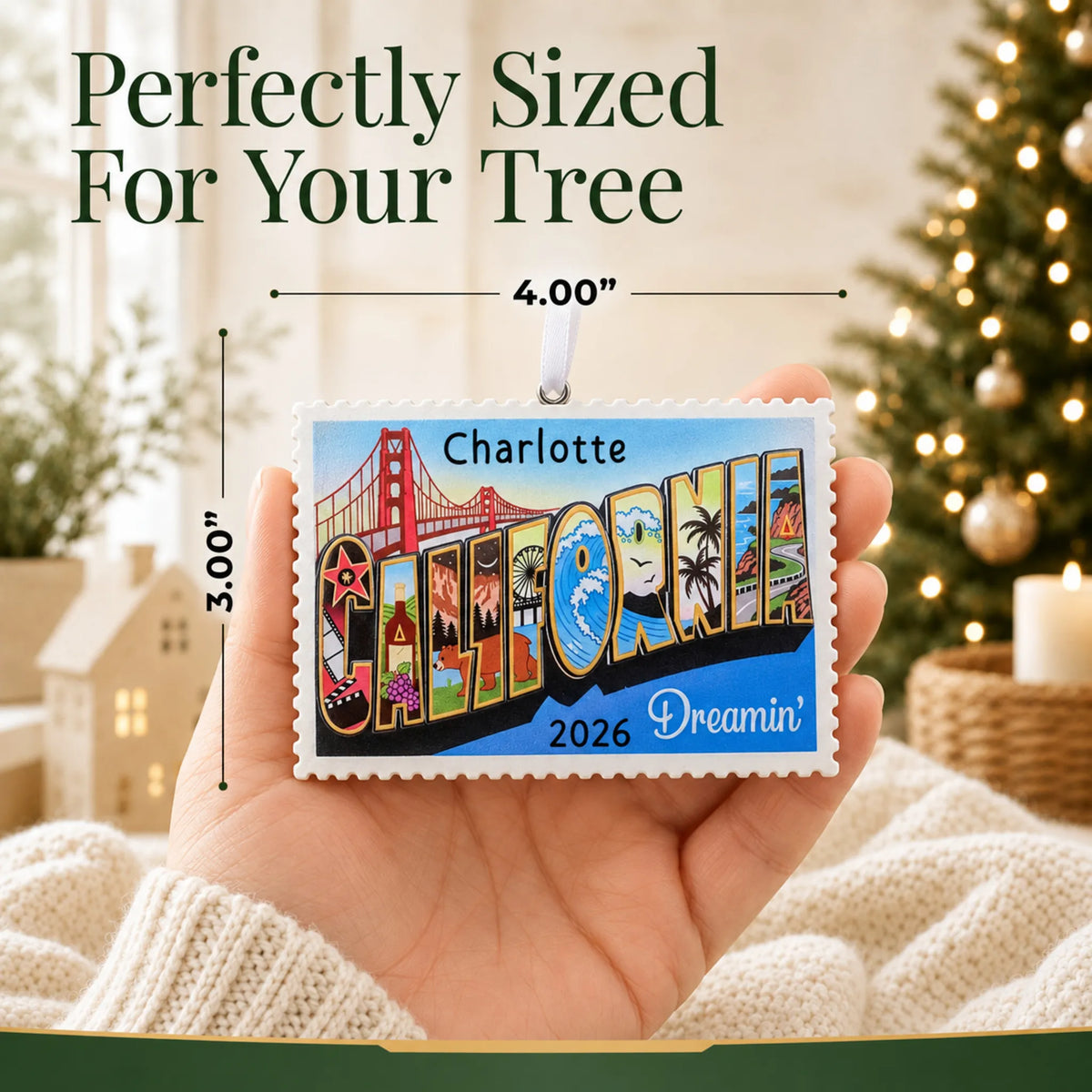 Size guide: the personalized California postcard christmas ornament is 4.00 in wide by 3.00 in tall, shown in hand