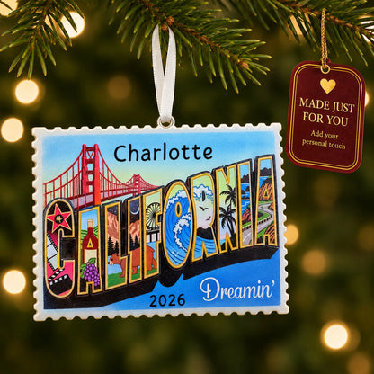 California postcard christmas ornament hanging on a lit Christmas tree with a Made Just For You gift tag