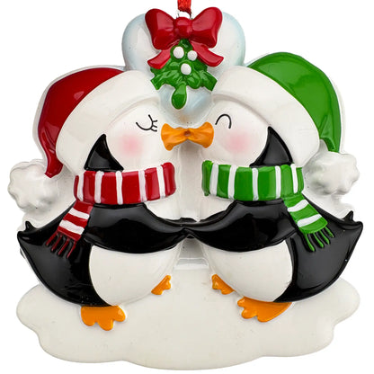 Penguin couple personalized Christmas ornament shown blank before the names, year, and custom heart message are laser engraved