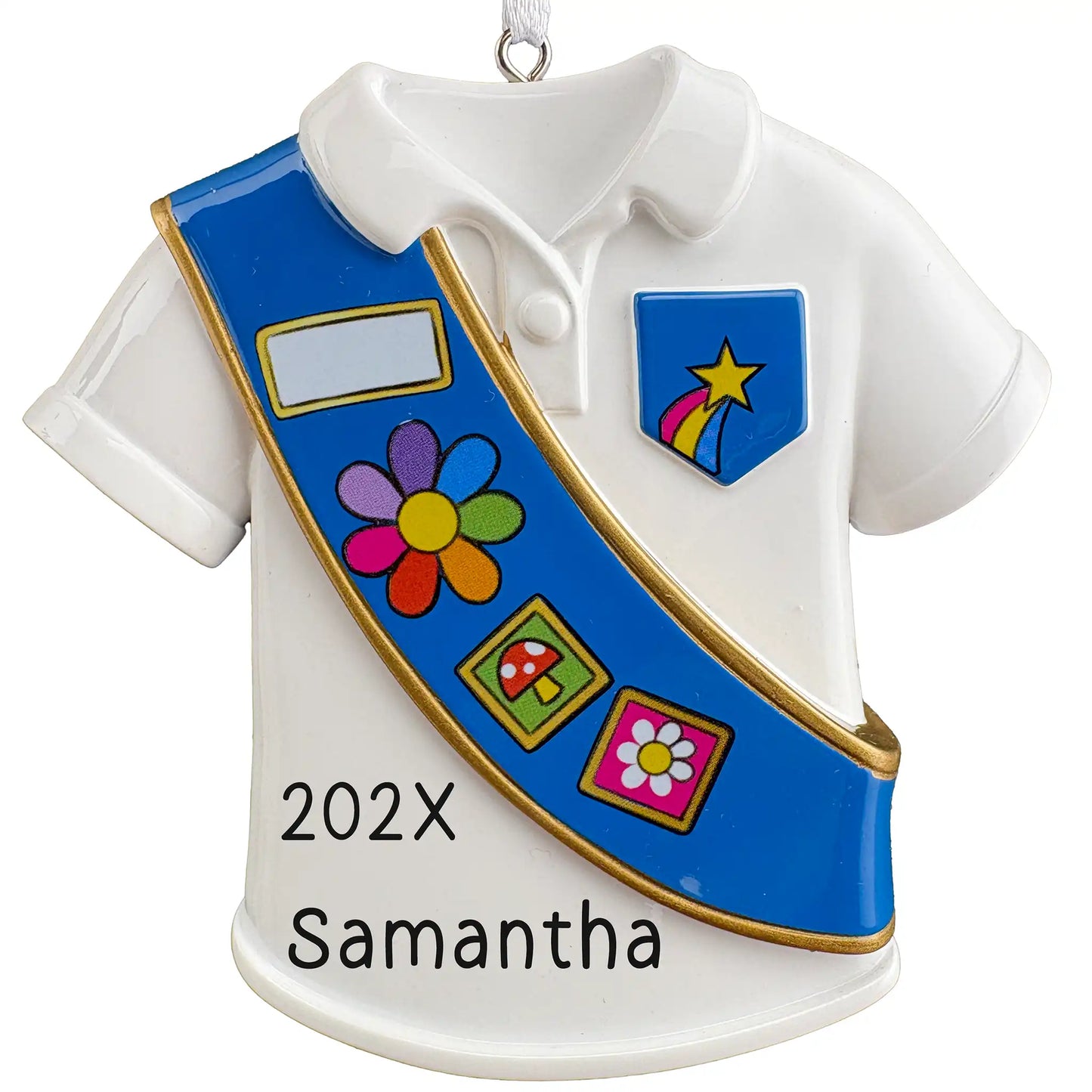 Personalized Girl Scout ornament, white uniform shirt with blue badge sash and shooting star pocket patch, name and year laser engraved on the shirt front
