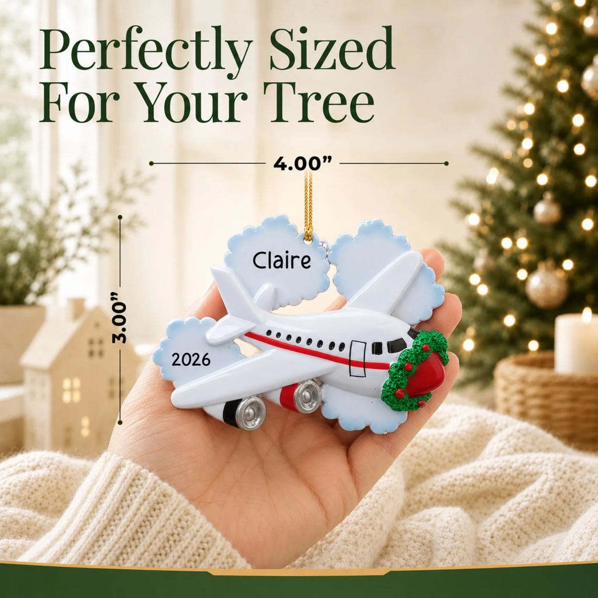 Size guide: the personalized jet airplane travel christmas ornament is 4.00 in wide by 3.00 in tall, shown in hand