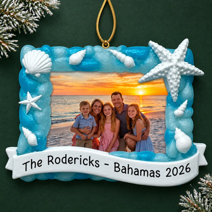 Personalized beach vacation photo frame christmas ornament on a dark green pine background