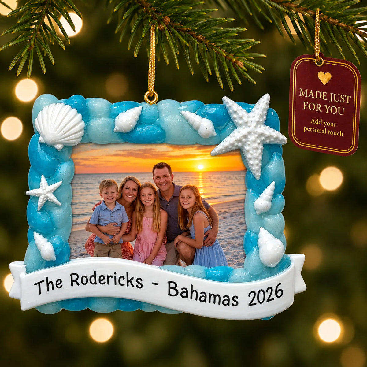 Beach vacation photo frame christmas ornament hanging on a lit Christmas tree with a Made Just For You gift tag