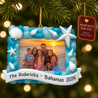 Beach vacation photo frame christmas ornament hanging on a lit Christmas tree with a Made Just For You gift tag