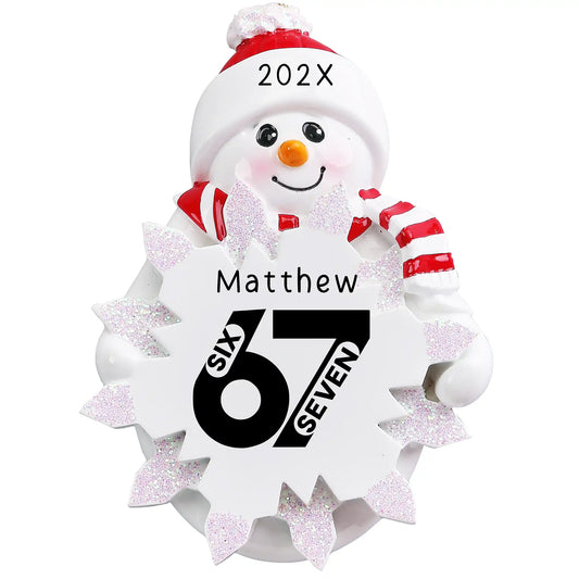 Personalized Christmas ornament featuring a snowman holding a glittery snowflake printed with the viral Gen Alpha slang term "6-7" (SIX SEVEN), perfect as a pop culture gift.