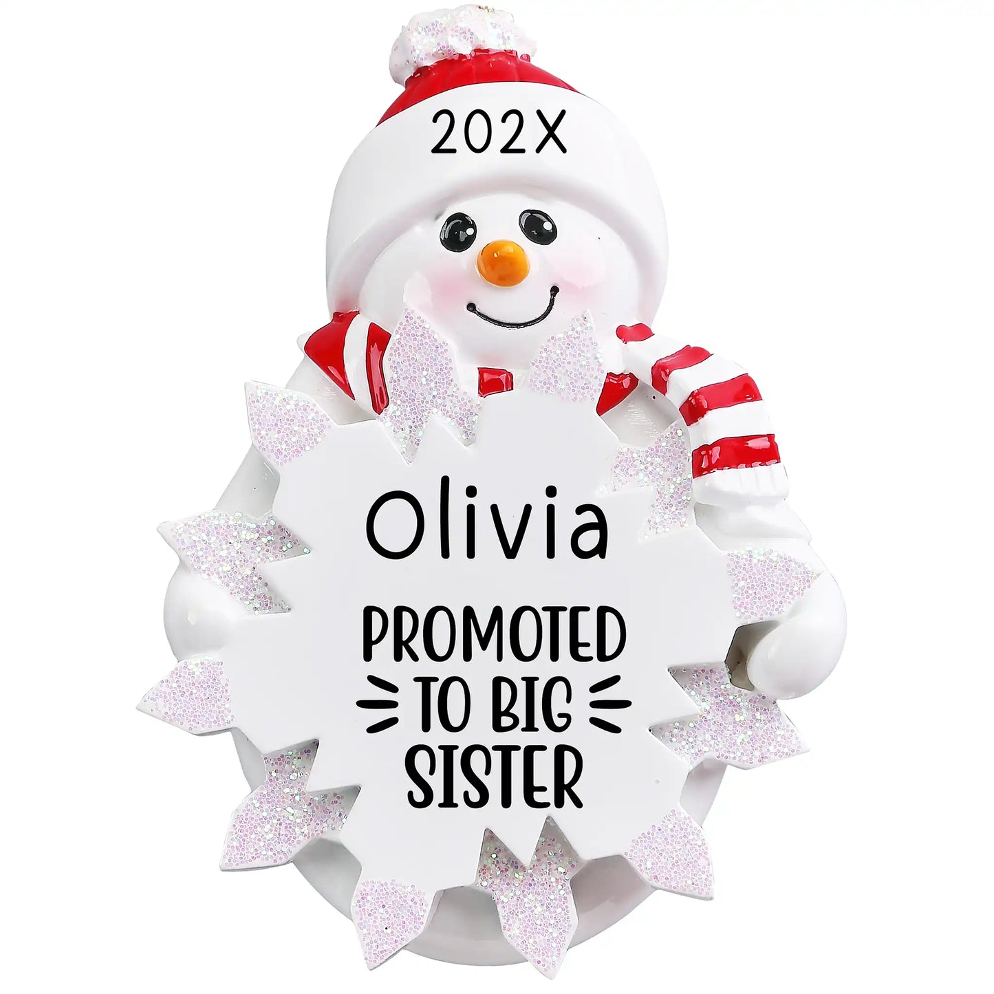 Personalized snowman ornament with “Promoted to Big Sister” engraving, red hat and scarf, and glitter snowflake personalized with name and year.