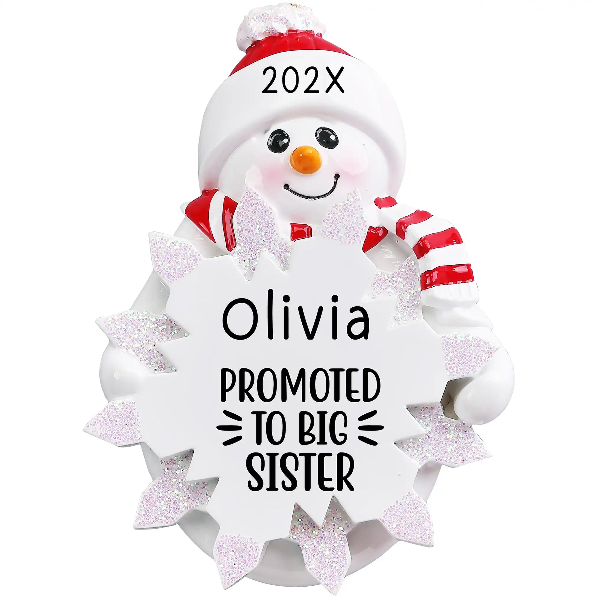 Personalized snowman ornament with “Promoted to Big Sister” engraving, red hat and scarf, and glitter snowflake personalized with name and year.