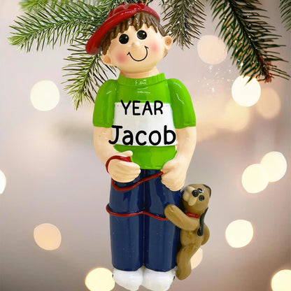 Adorno navideño de niño con perro 