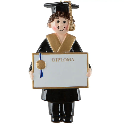 Personalized graduation boy Christmas ornament featuring a smiling graduate in a black cap and gown holding a diploma, customized with name and year