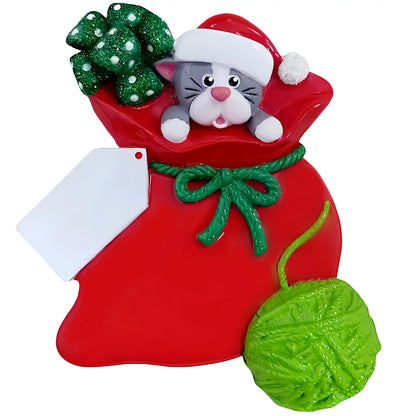 Custom first Christmas cat ornament with laser engraved name on gift tag and year on yarn ball, perfect new kitten keepsake