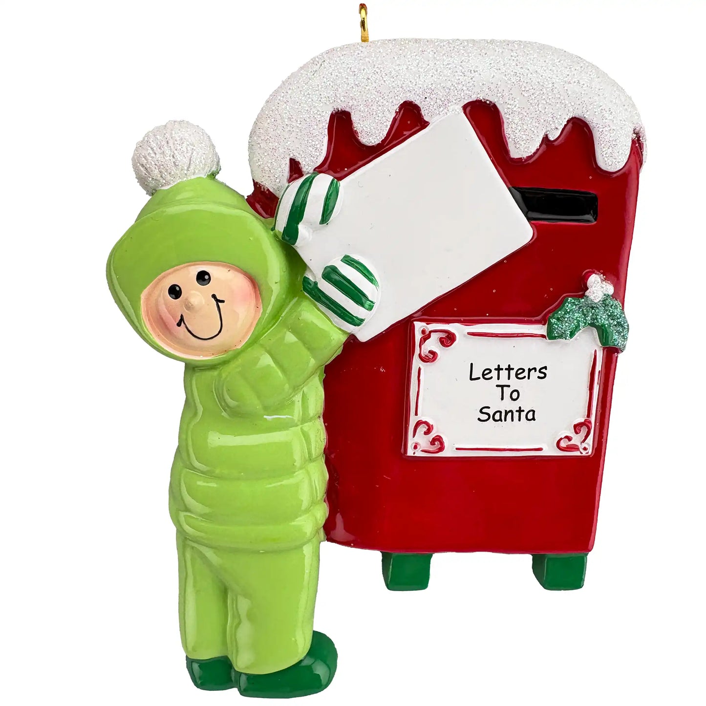 Christmas ornament of a child in a green outfit delivering letters to Santa at a red mailbox.