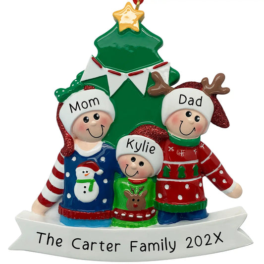 Personalized Christmas ornament of a family of three wearing ugly sweaters with a Christmas tree in the background.