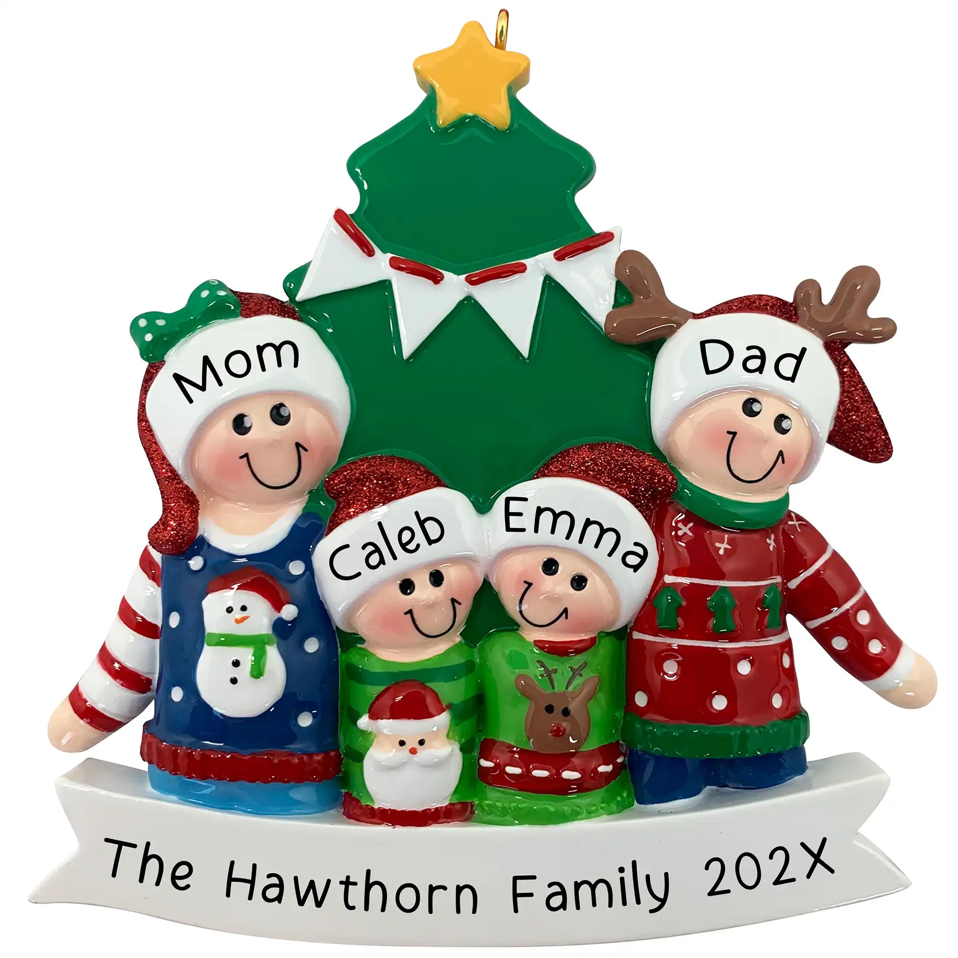 Family of 4 with 2 parents and 2 kids dressed in ugly Christmas sweaters standing in front of a Christmas tree.