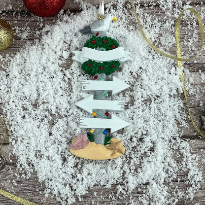 Adorno navideño con letreros de playa 