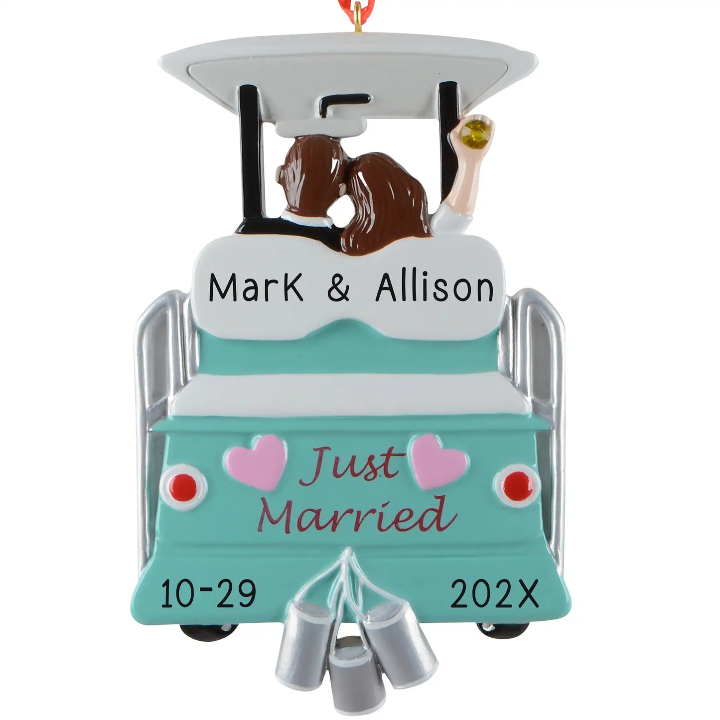 Personalized just married Christmas ornament, a teal getaway cart with tin cans and pink hearts, a kissing bride and groom, engraved Mark & Allison with the wedding date and year