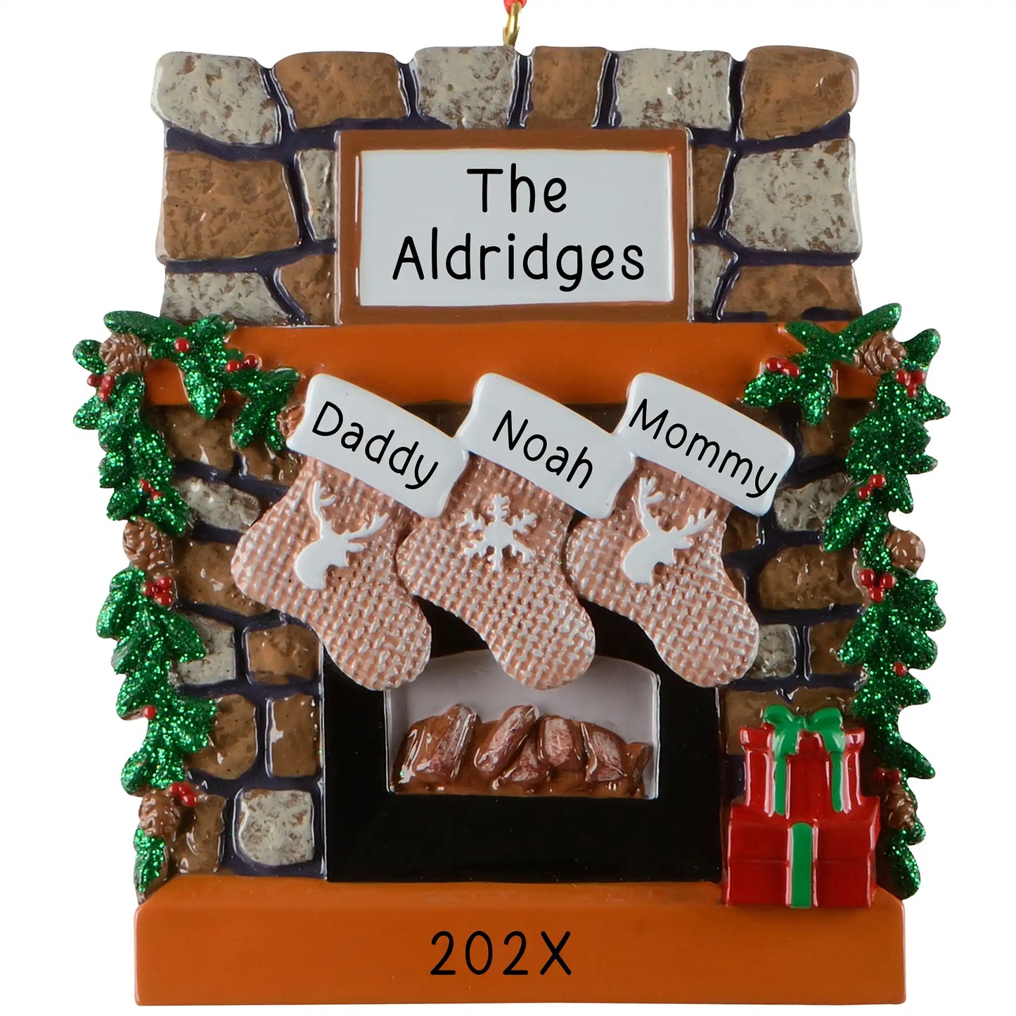 Personalized family of 3 Christmas ornament, a rustic stone fireplace with three named stockings, garland, and a lit hearth, engraved The Aldridges with the year
