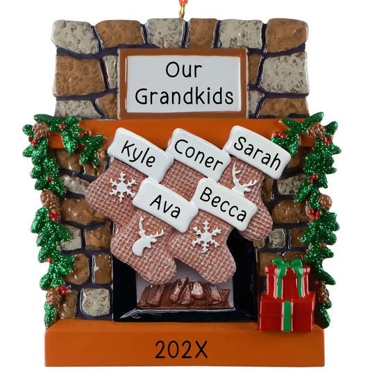 Personalized family of 5 Christmas ornament, a rustic stone fireplace with five named stockings, garland, and a lit hearth, engraved with the family name and year