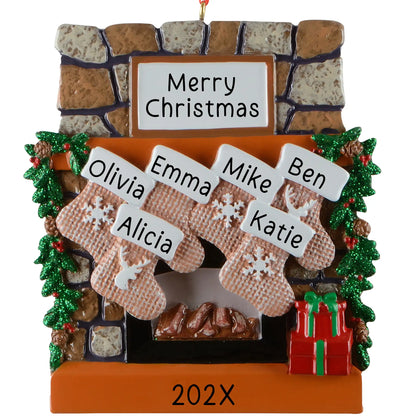 Personalized family of 6 Christmas ornament, a rustic stone fireplace with six named stockings, garland, and a lit hearth, engraved with the family name and year