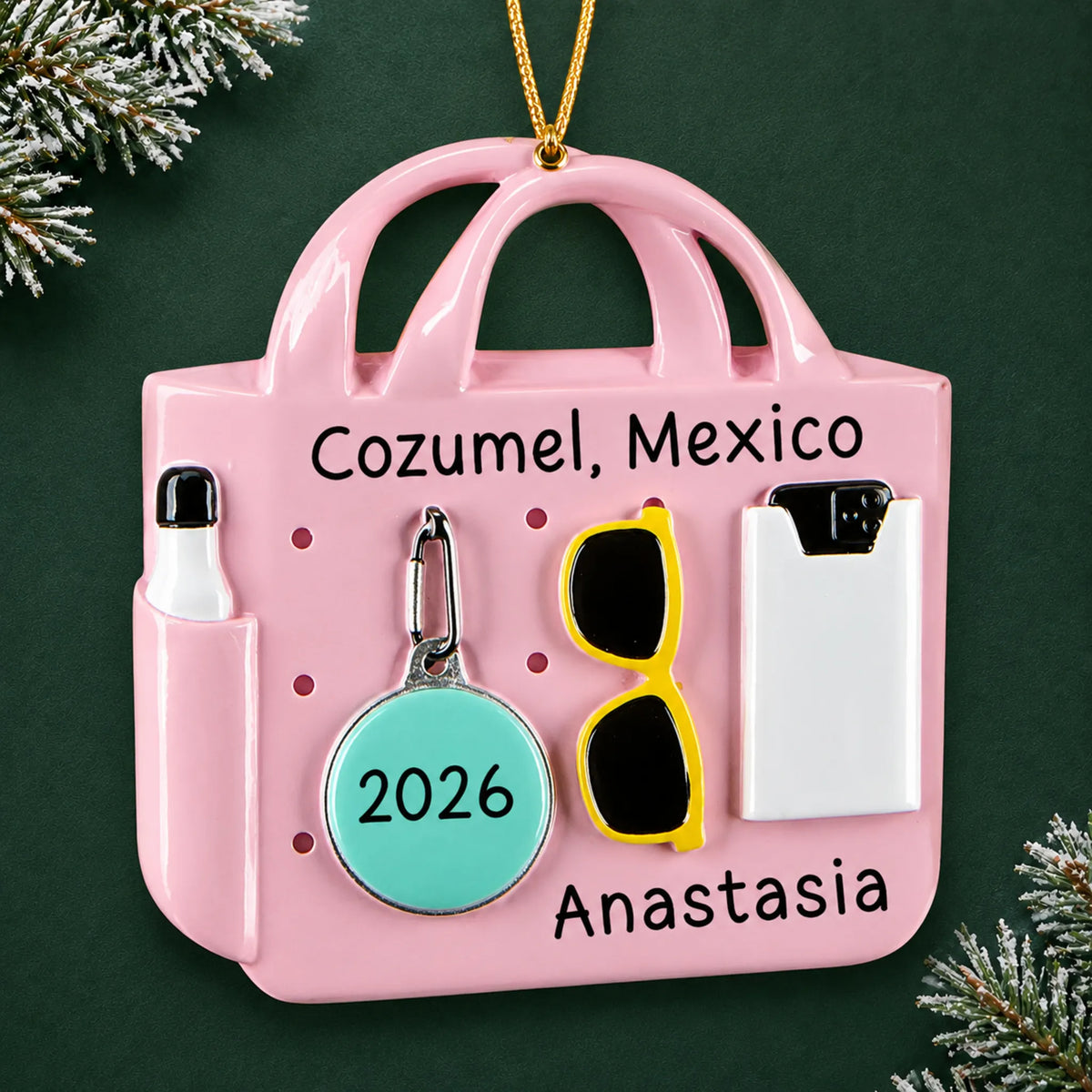 Personalized pink beach bag christmas ornament, a pink beach tote bag with sunglasses, on a dark green pine background