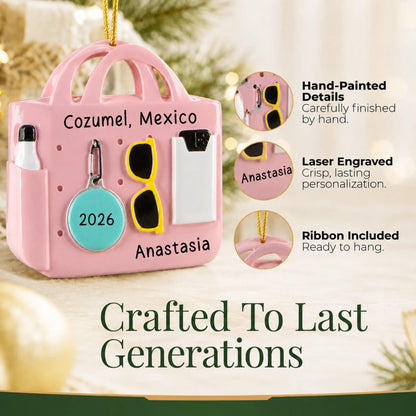 Hand-painted details and laser engraved personalization on the pink beach bag christmas ornament, ribbon included