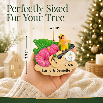 Size guide: the personalized 5 O'Clock Somewhere parrot christmas ornament is 4.00 in wide by 3.75 in tall, shown in hand