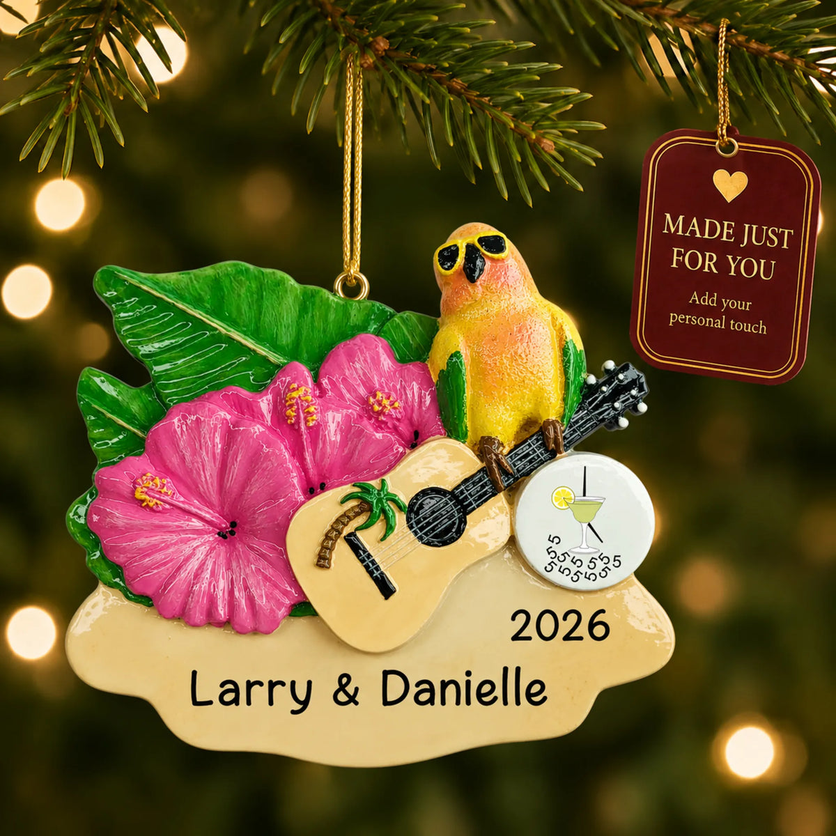 5 O'Clock Somewhere parrot christmas ornament hanging on a lit Christmas tree with a Made Just For You gift tag