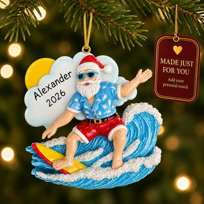 Big wave surfing Santa christmas ornament hanging on a lit Christmas tree with a Made Just For You gift tag