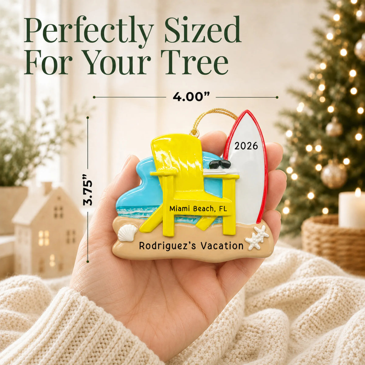 Size guide: the personalized Adirondack chair and surfboard christmas ornament is 4.00 in wide by 3.75 in tall, shown in hand