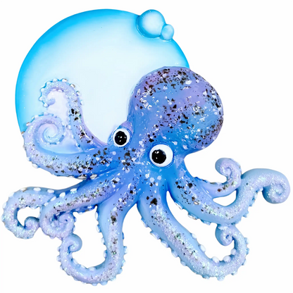 A personalized Christmas ornament of a glittery blue octopus with a large blue bubble for custom engraved names and messages.