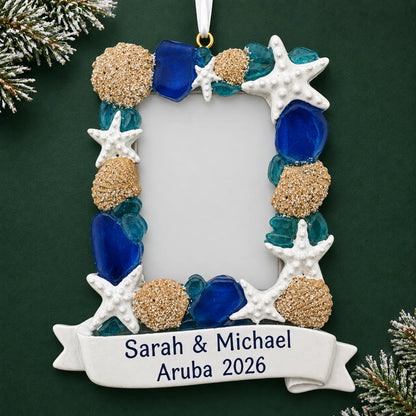 Personalized beach seashells photo frame christmas ornament on a dark green pine background