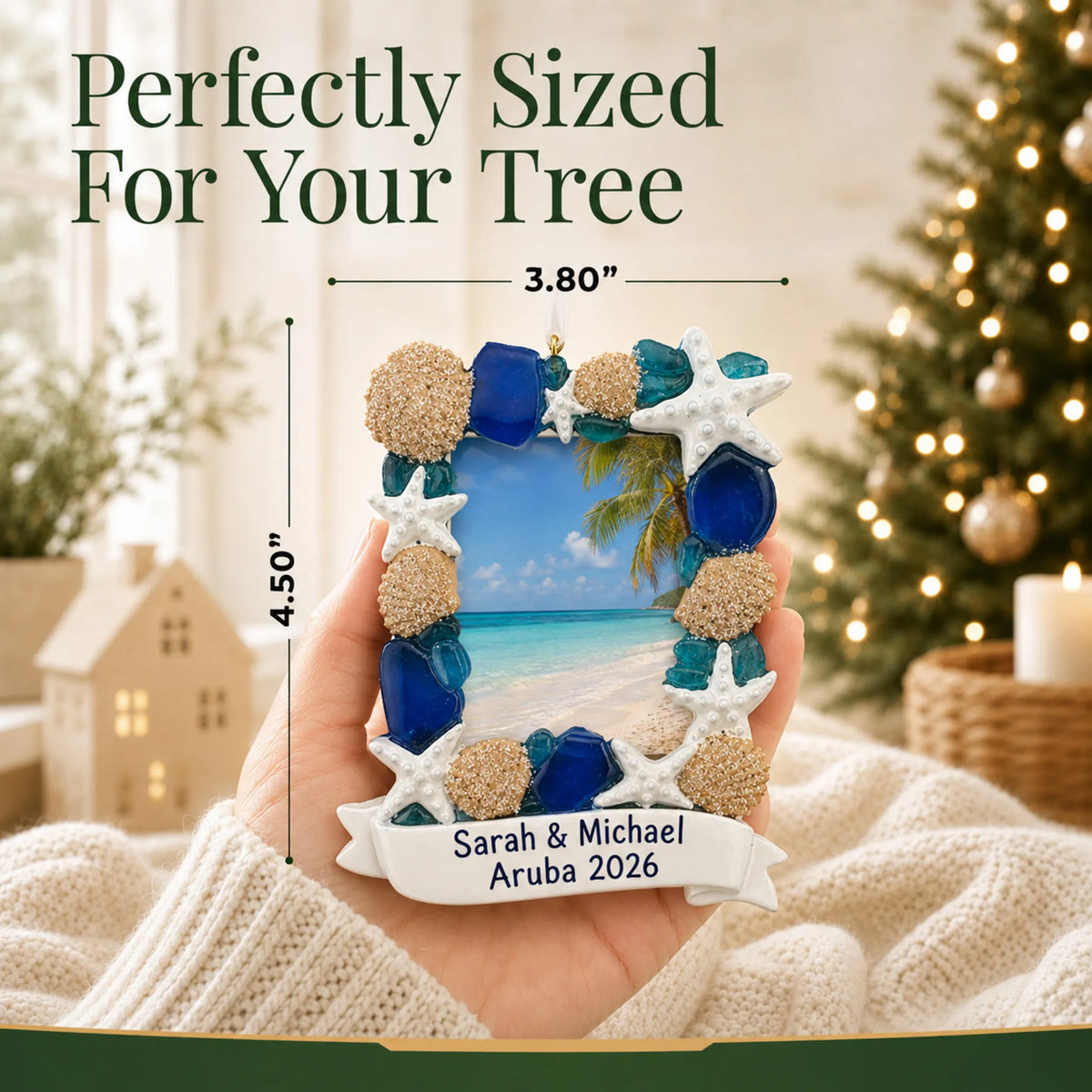 Size guide: the personalized beach seashells photo frame christmas ornament is 3.80 in wide by 4.50 in tall, shown in hand