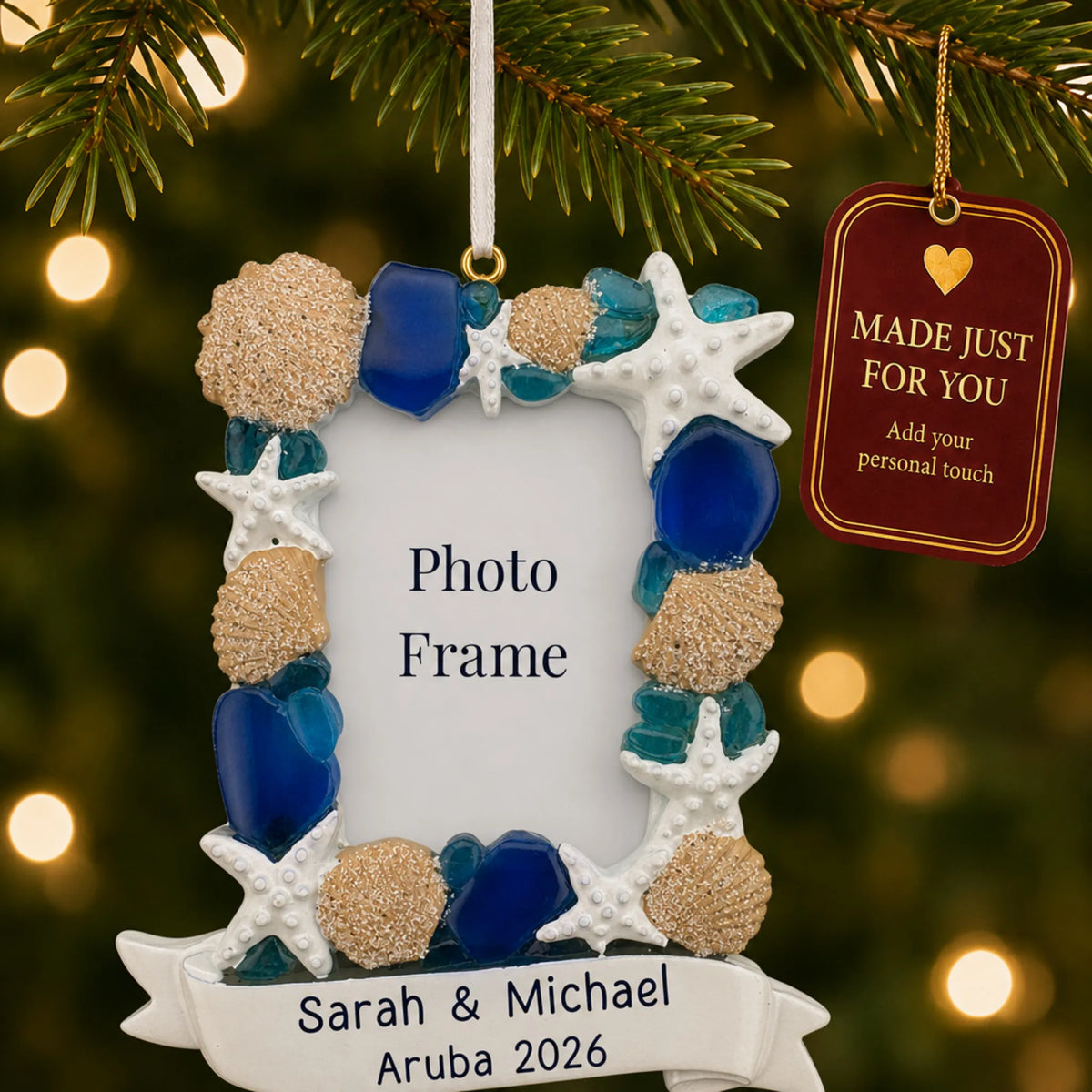 Beach seashells photo frame christmas ornament hanging on a lit Christmas tree with a Made Just For You gift tag