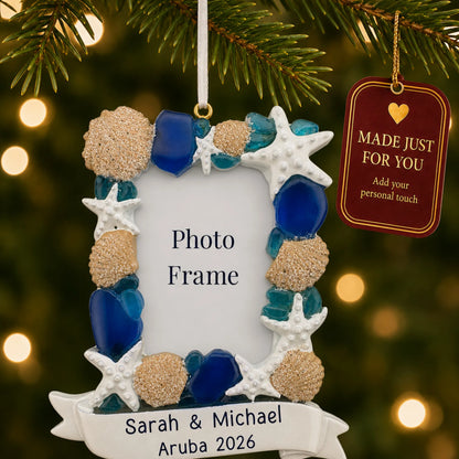 Beach seashells photo frame christmas ornament hanging on a lit Christmas tree with a Made Just For You gift tag