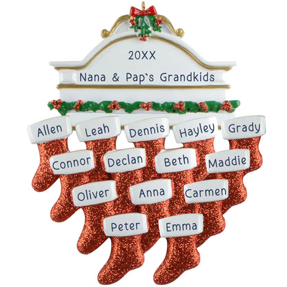 Personalized red stocking family ornament with 14 names, white plaque, and glitter accents