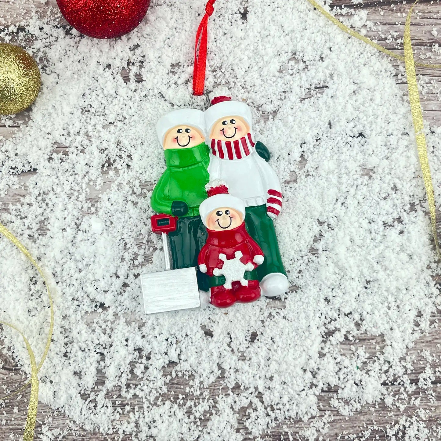 Adorno personalizado de familia de 3 palas de nieve 