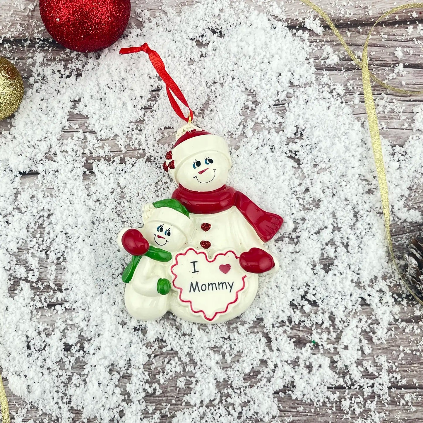 Adorno navideño de mamá con un hijo 