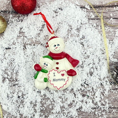 Adorno navideño de mamá con un hijo 