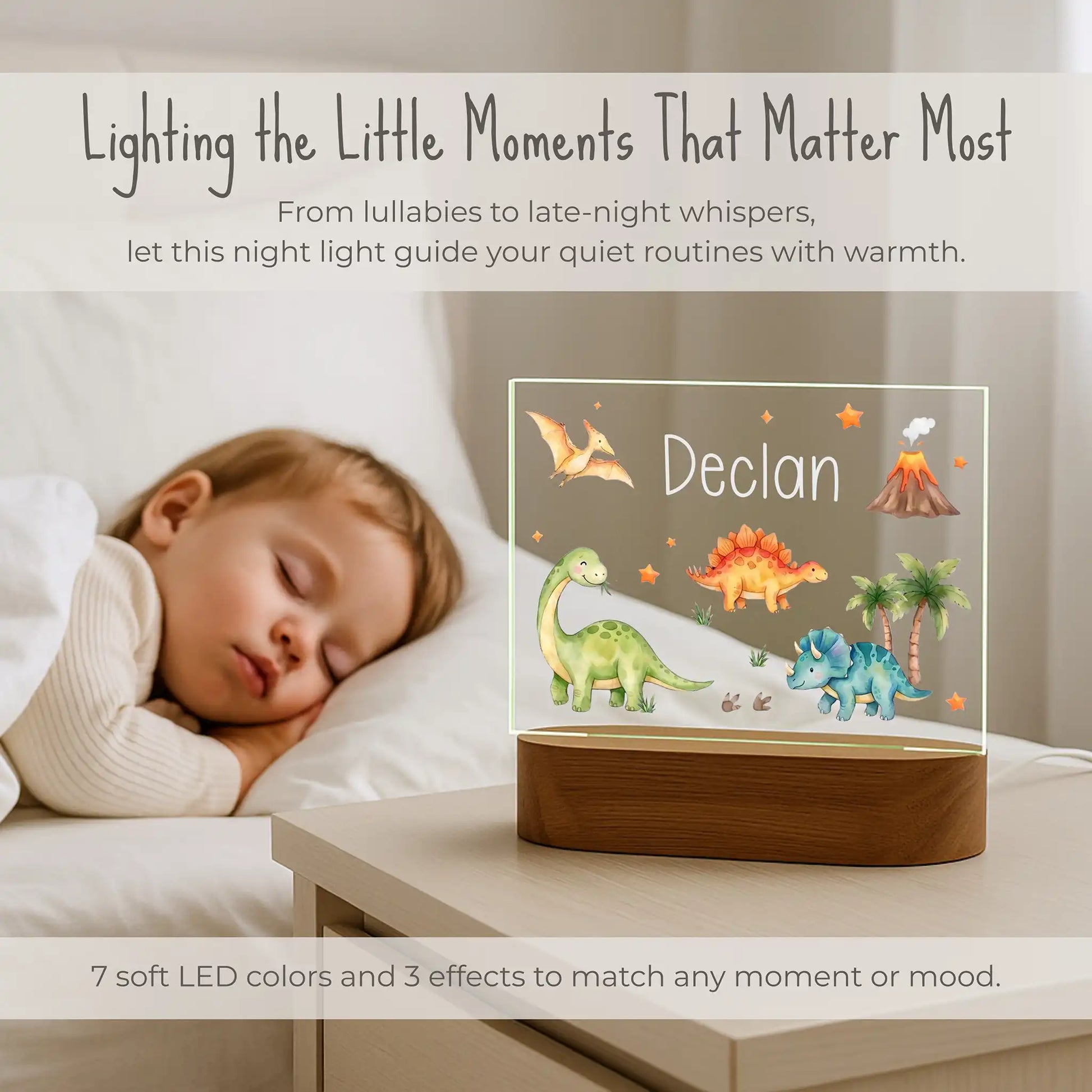 Personalized dinosaur night light lit on a nightstand beside a sleeping child with 7 LED color options
